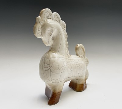 Lot 1305 - A cream Newlyn Pottery horse in Medallion...