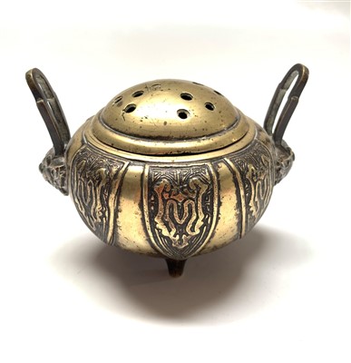 Lot 729 - A Chinese polished bronze censer, with a pair...