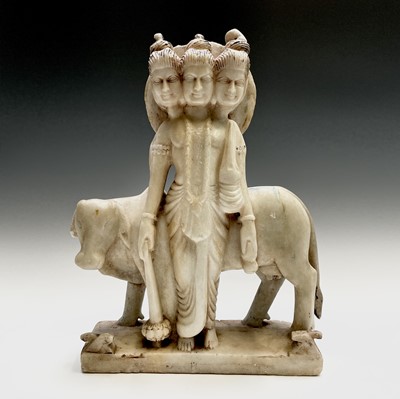 Lot 1069 - An Indian alabaster group of Dattatrayer,...