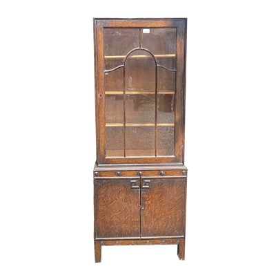 Lot 3053 - A 1930's oak bookcase/display cabinet,...