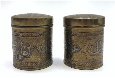 Lot 742 - Two Cairoware brass jars and covers, circa...