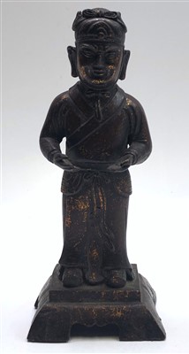 Lot 744 - A Chinese cast iron figure of a man, height 32cm.