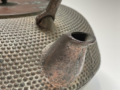 Lot 16 - A Japanese iron teapot, 19th century,...