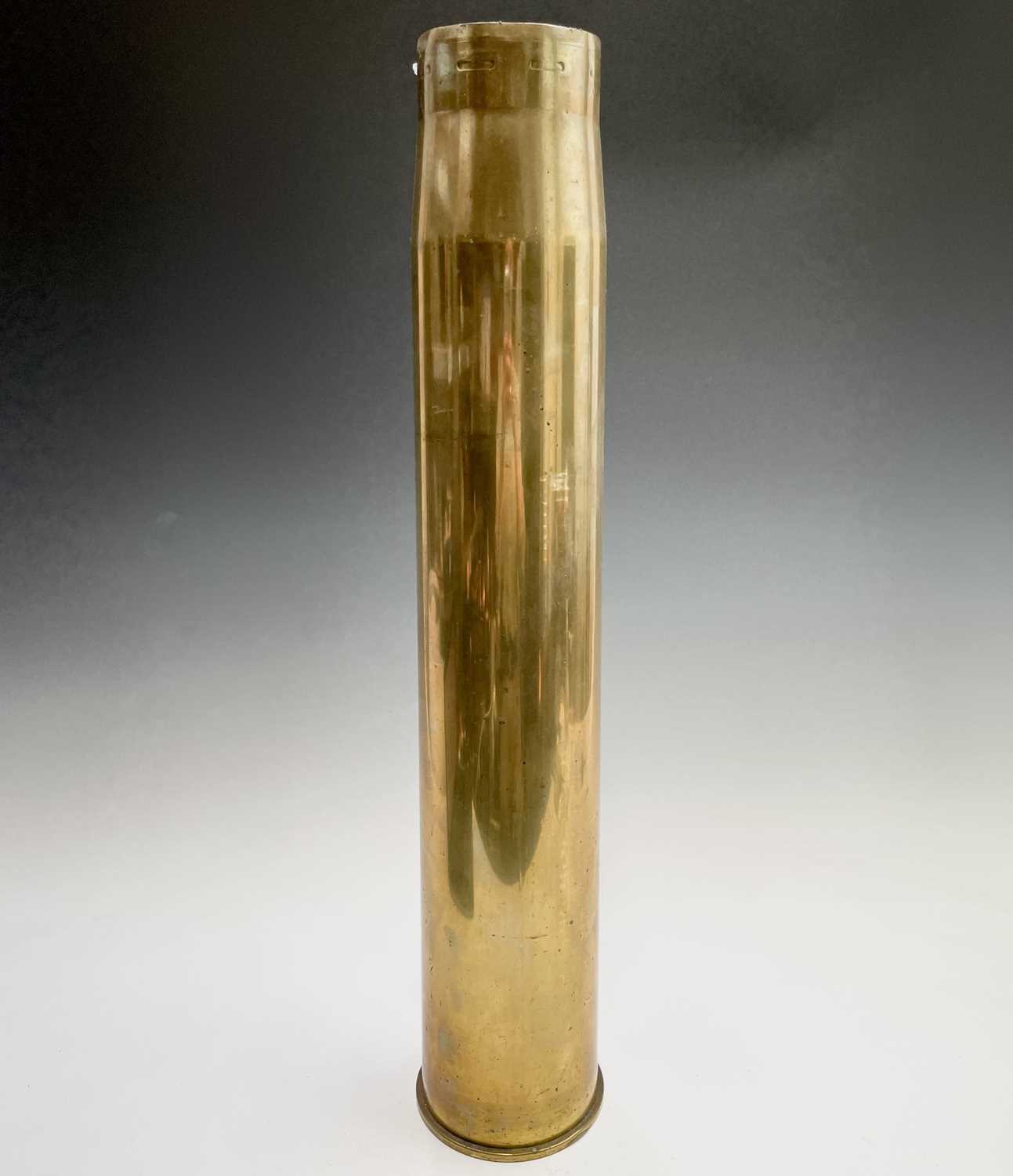 Lot 39 - A tall brass shell case from a Vickers 3.7