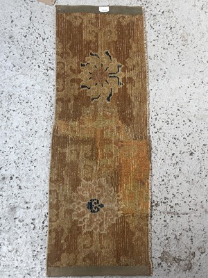 Lot 1279 - A Chinese rectangular rug fragment, 19th...