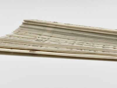 Lot 363 - A Chinese ivory fan, circa 1920, with foliate...