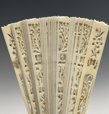 Lot 363 - A Chinese ivory fan, circa 1920, with foliate...