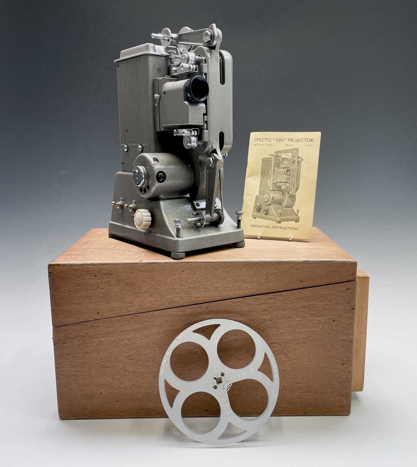 Lot 122 - A Specto 500 projector, height 36cm, with wood...