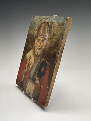 Lot 48 - A Russian softwood icon, circa 1900, painted...