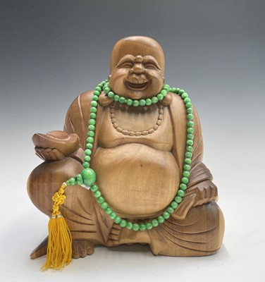 Lot 329 - A Chinese carved wood buddha, height 32.5cm,...