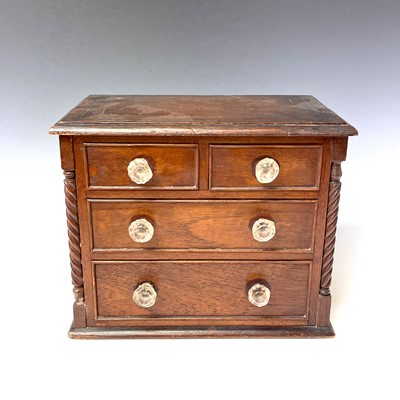 Lot 253 - A Victorian walnut apprentice chest of two...