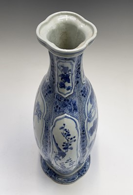 Lot 1 - A Chinese porcelain blue and white vase, six...