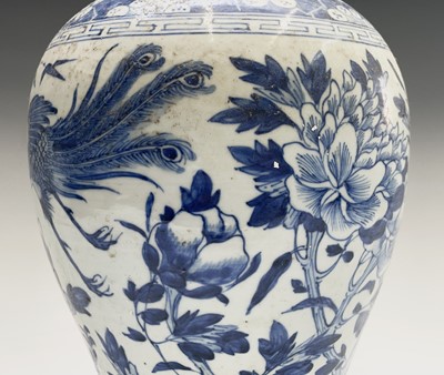 Lot 36 - A Chinese porcelain blue and white baluster...