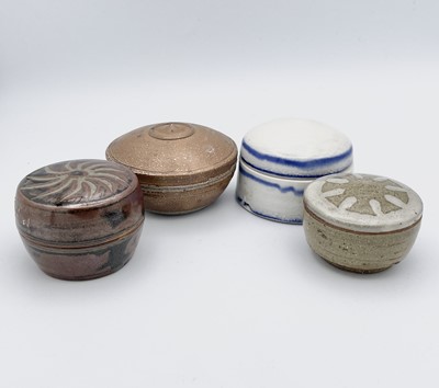 Lot 1288 - Four studio pottery cosmetic boxes