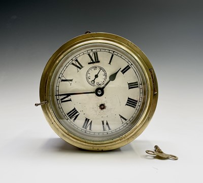 Lot 2916 - A brass cased ship's bulkhead wall clock,...