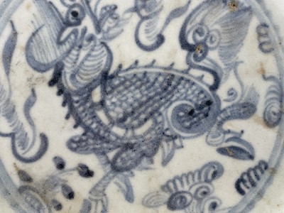 Lot 31 - A Chinese blue and white dish, Ming Dynasty,...