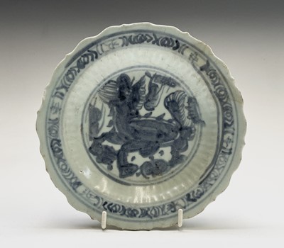 Lot 30 - A Chinese blue and white dish, Ming Dynasty,...