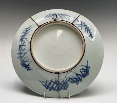 Lot 28 - A Chinese porcelain blue and white charger,...