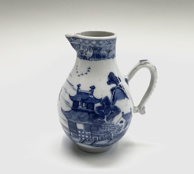 Lot 25 - A Chinese Export porcelain blue and white jug,...