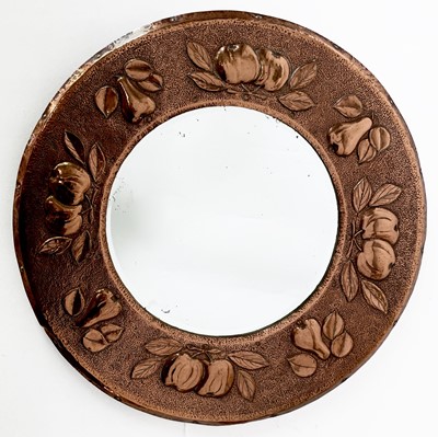 Lot 2 - An early Newlyn copper circular wall mirror,...