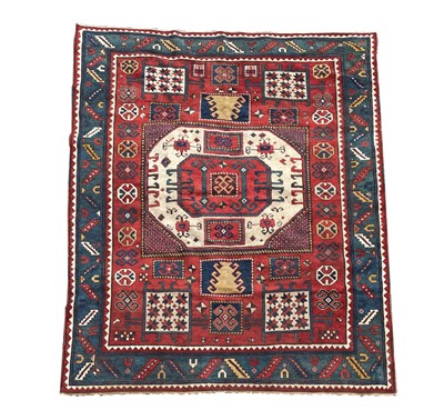 Lot 1221 - A Karachov Kazak rug, circa 1880, the madder...