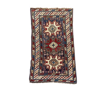 Lot 1241 - A Lesghi Shirvan rug, the indigo field with...