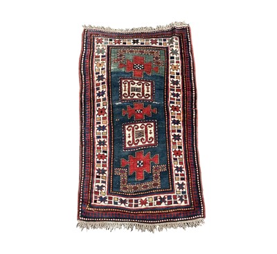 Lot 1245 - A Karachov Kazak dated rug, circa 1910, the...