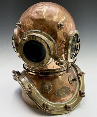Lot 86 - A 12-bolt copper diving helmet by Siebe Gorman...