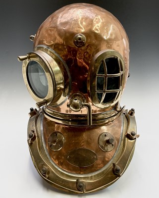 Lot 86 - A 12-bolt copper diving helmet by Siebe Gorman...