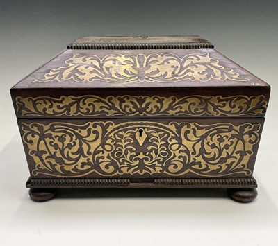 Lot 14 - A Regency rosewood and cut brass inlaid box or...