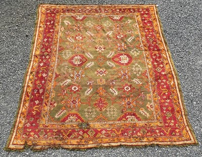 Lot 1272 - An Ushak carpet, West Anatolia, the green...
