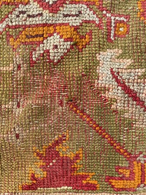 Lot 1272 - An Ushak carpet, West Anatolia, the green...