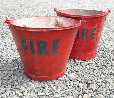 Lot 169 - Two red painted 'FIRE' buckets. The tallest...