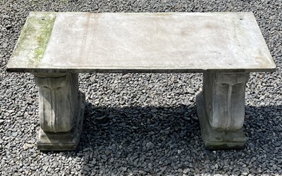 Lot 612 - A garden bench, the marble slab seat raised on...