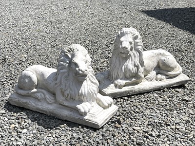 Lot 610 - A pair of white painted composition stone...