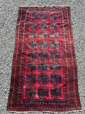 Lot 1274 - An Belouch long rug, circa 1930-50, 313 x...
