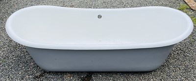 Lot 638 - A double ended cast iron enamel bath, modern,...