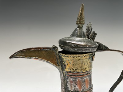 Lot 1017 - A Saudi Arabian brass and silvered copper...
