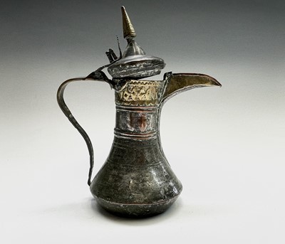 Lot 1017 - A Saudi Arabian brass and silvered copper...