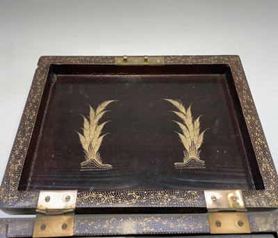 Lot 67 - A Chinese Export black lacquer gilt decorated...