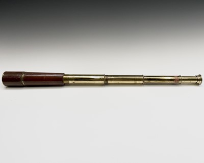 Lot 110 - A Naval brass three draw telescope, by...