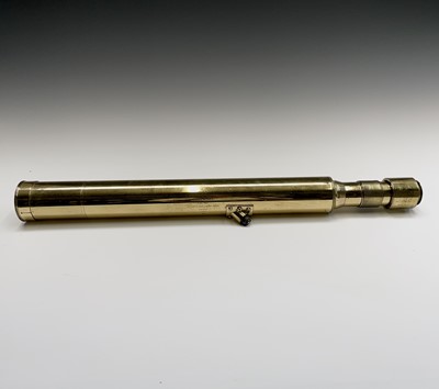 Lot 115 - A Naval brass day and night telescope gunsight,...