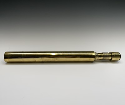 Lot 115 - A Naval brass day and night telescope gunsight,...