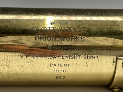 Lot 115 - A Naval brass day and night telescope gunsight,...