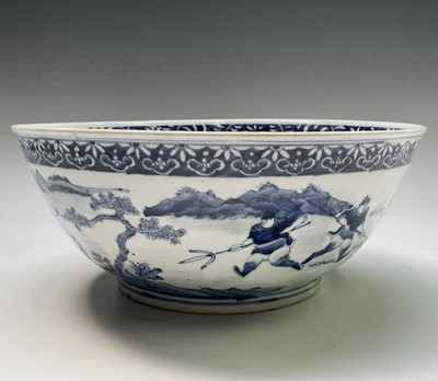 Lot 61 - A large Chinese porcelain blue and white punch...
