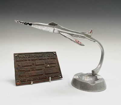 Lot 117 - An aluminium ashtray, modelled with a fighter...