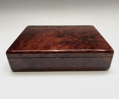 Lot 210 - A burr wood humidor. Height 7cm, width 30cm,...