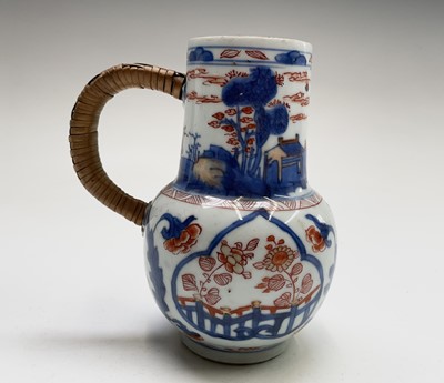 Lot 71 - A Chinese famille rose porcelain jug, height 9....