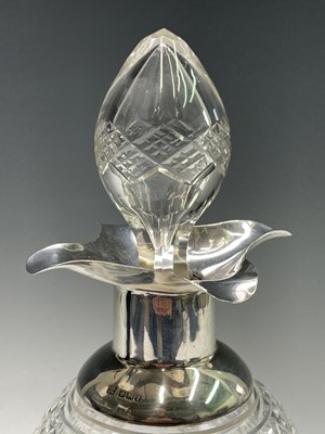 Lot 34 - A good cut glass ovoid footed decanter with...