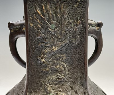 Lot 124 - A pair of Chinese bronze vases, 18th/19th...